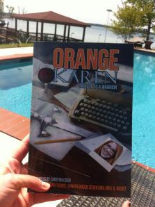 Reader Amy reads Orange Karen poolside.