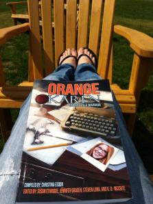 Reader Holly proves that spring is on its way and enjoys her short stories al fresco.